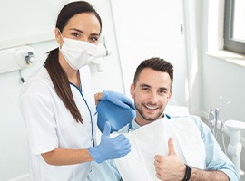 Patient in Brick Township smiling at dental emergency appointment